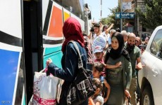 مئات السوريين يعودون الى بلدهم بموجب اتفاق بين الحكومة اللبنانية ونظيرتها السورية
