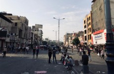 اطلاق قنابل مسيلة للدموع باتجاه التحرير وحرائق اسفل جسر الجمهورية
